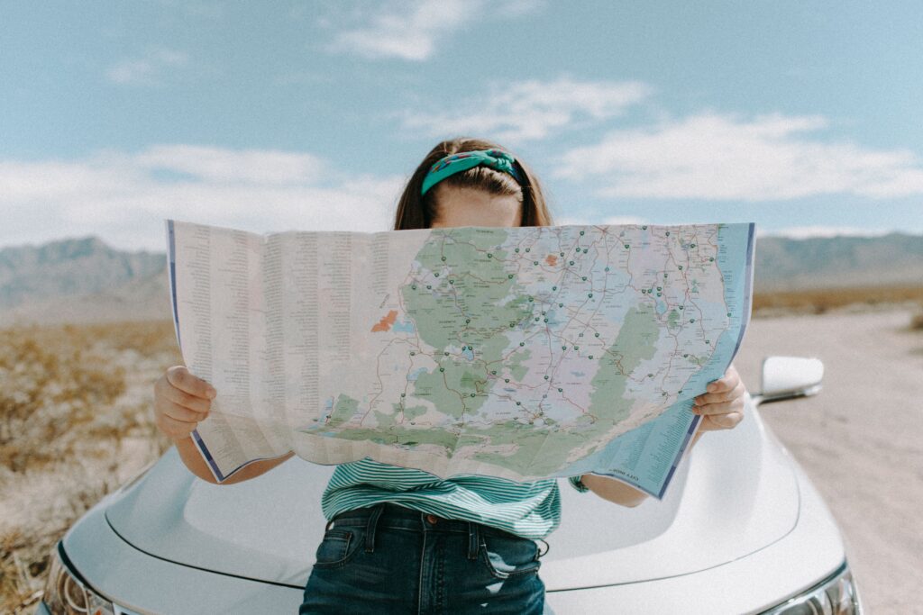 girl reading map