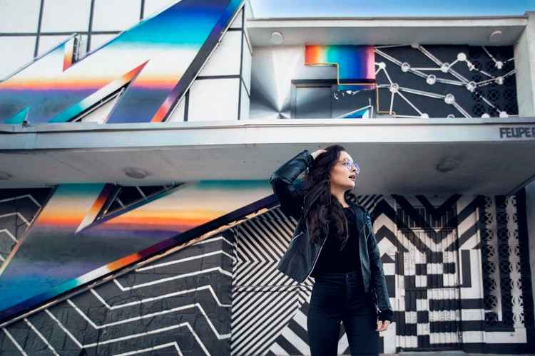 Girl in front of building