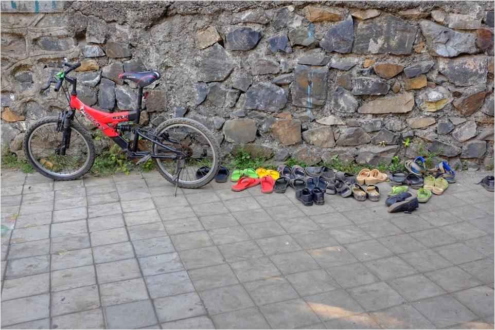 Cycle and shoes on the road