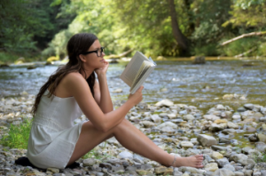 woman reading a book.