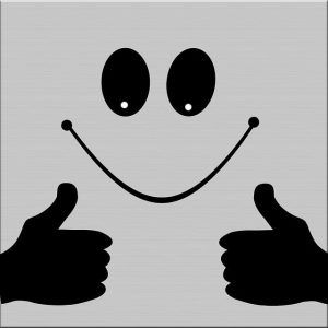 A black and white illustration of a smiling face with both thumbs raised in approval.